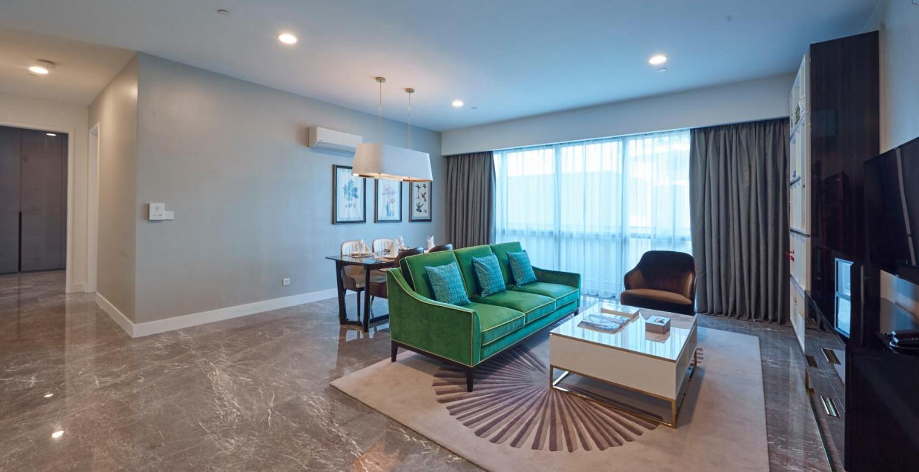 The Face Style Hotel Kuala Lumpur Kültér fotó A living room in a typical apartment